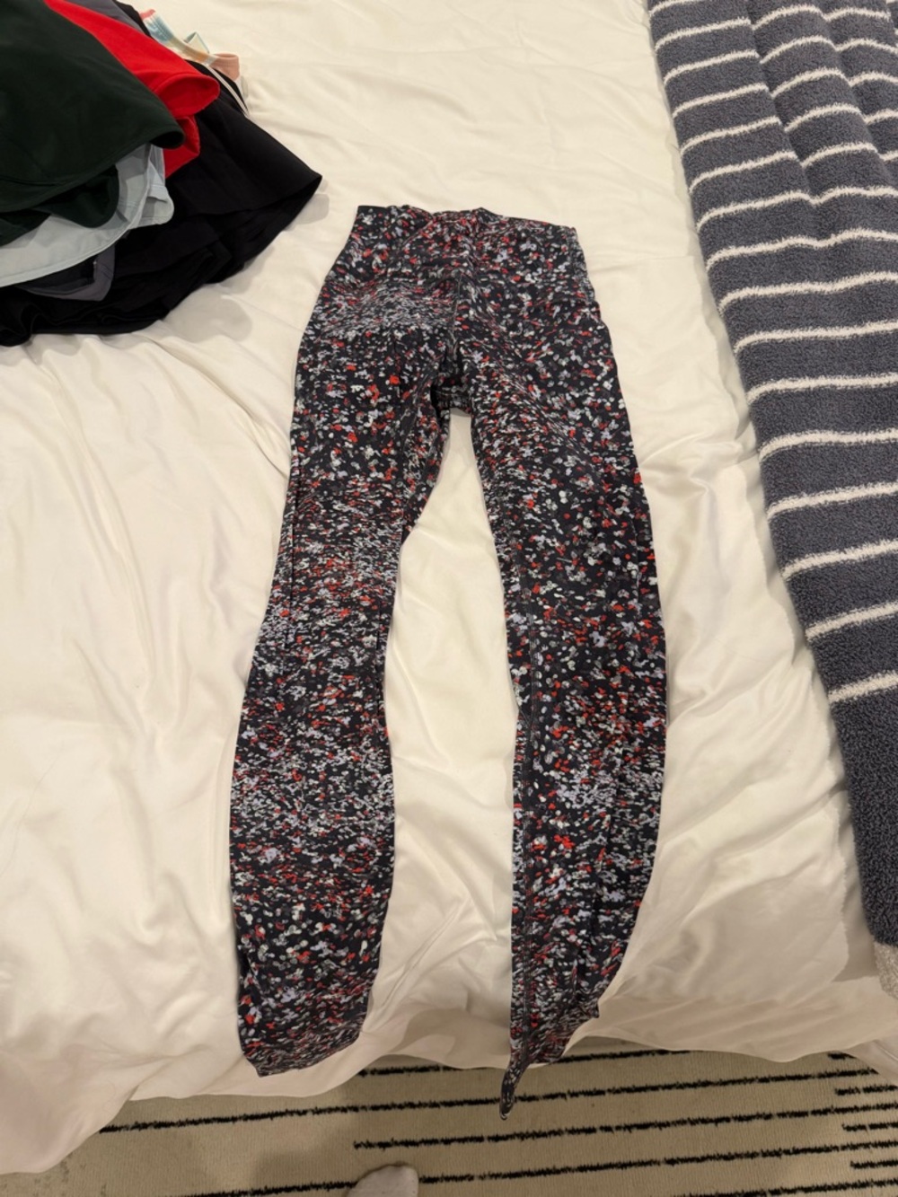 Lululemon Patterned Black Leggings with Red and White Speckle Print